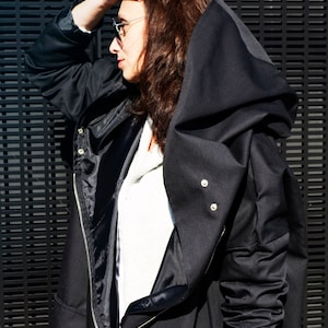 Black oversize coat with huge hood for autumn
