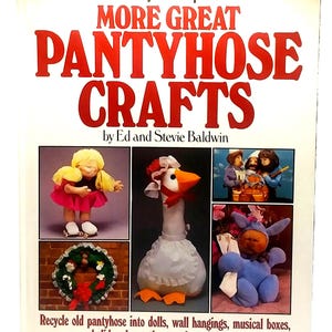 May include: A book cover titled "MORE GREAT PANTYHOSE CRAFTS" by Ed and Stevie Baldwin. The cover features images of crafts made from pantyhose, including dolls, a goose, a wreath, and other figures. The text below reads: Recycle old pantyhose into dolls, wall hangings, musical boxes, holiday decorations, and much more.