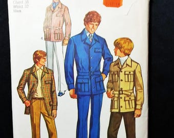 May include: Vintage Simplicity sewing pattern featuring illustrations of men's suits. The pattern includes a size 38 chest and 32 waist. The cover has the text "Simplicity" and the number "9123".