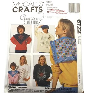 May include: McCall's Crafts sewing pattern envelope featuring images of creative clothing designs. The envelope includes the text "Creative Clothing" and the pattern number 6722. The designs include sweaters with decorative embellishments.