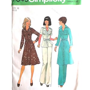 May include: Simplicity sewing pattern 7649 for Misses' dresses and pantsuits. The pattern features illustrations of three different outfits: a brown dress with star accents, a white pantsuit, and a turquoise dress and pants set. Size 10.