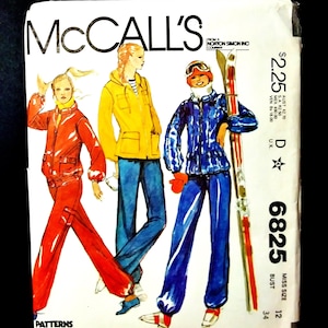 May include: A vintage McCall's sewing pattern featuring illustrations of three figures in colorful ski outfits. The pattern includes a red jumpsuit, a yellow jacket with blue pants, and a blue ski suit with skis. The pattern number is 6825.