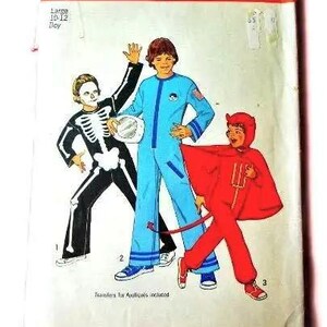 May include: Simplicity sewing pattern featuring three costume designs: a skeleton, an astronaut, and a devil. The pattern is for sizes 10-12. The package has a red and white border with the Simplicity logo.