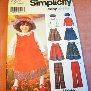 May include: Simplicity sewing pattern 5936 for children's clothing. The pattern includes options for dresses, tops, and pants. The cover features a girl wearing a red dress with a floral hem and matching hat. The pattern is size A.