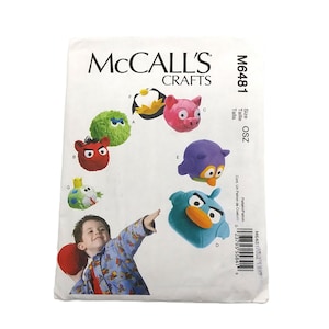 May include: A McCall's Crafts pattern envelope featuring various Angry Birds plush toy designs. The envelope includes images of the finished plushies in different colors and styles, along with the pattern number M6481.
