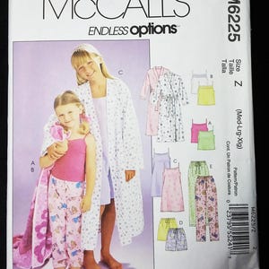 May include: McCall's sewing pattern M6225, featuring a variety of sleepwear designs. The pattern includes options for robes, tops, shorts, and pants. The cover shows two girls modeling the sleepwear. Size Z (Med-Lrg-Xlg).