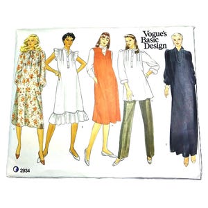 May include: A vintage Vogue's Basic Design sewing pattern featuring illustrations of five different dress designs. The pattern cover displays drawings of women in various dresses, including a floral print dress, a white dress with ruffles, and a long black dress.