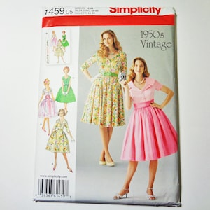 May include: Simplicity sewing pattern featuring vintage 1950s dress designs. The cover displays illustrations of dresses in various colors and styles, including floral and solid pink. The pattern includes the text "1950s Vintage" and the Simplicity logo.