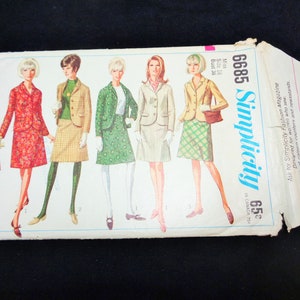 May include: Vintage Simplicity sewing pattern 6685 featuring illustrations of women in suits. The pattern cover shows various suit styles in red floral, plaid, and solid colors. The size is 16, with a bust size of 36 inches.