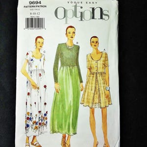 May include: Vogue Easy Options sewing pattern, size 8-10-12. The pattern features illustrations of three different dress designs. The cover is white with the number 9694 and the Vogue logo.