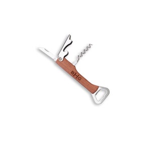 A multi-tool with a wooden handle engraved with the initials "BHG". The tool has a bottle opener, a corkscrew, and a small knife.