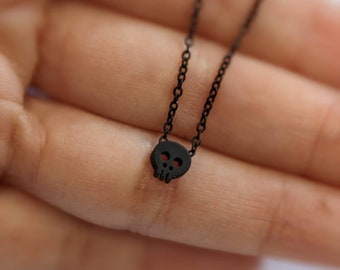 Tiny skull necklace, black necklace