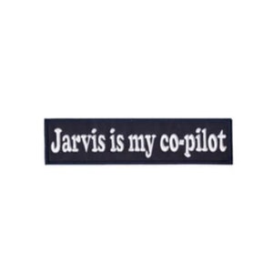 Puede incluir: Parche bordado en blanco y negro con el texto "Jarvis is my co-pilot".