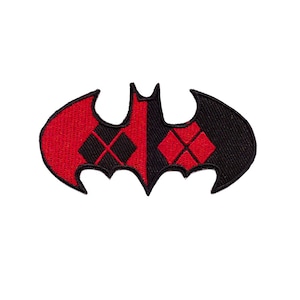May include: A black and red Batman logo patch with a diamond pattern on the red portion.