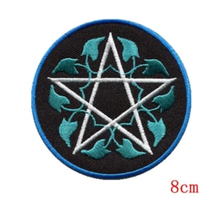 May include: A white pentagram with a blue outline surrounded by green leaves on a black background. The patch is 8 cm in diameter.