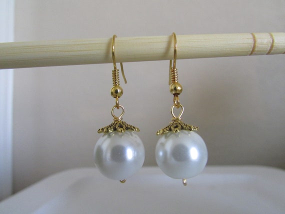 E006 - White Handmade Hanging Glass Pearl Earrings, | MakerPlace by Michaels