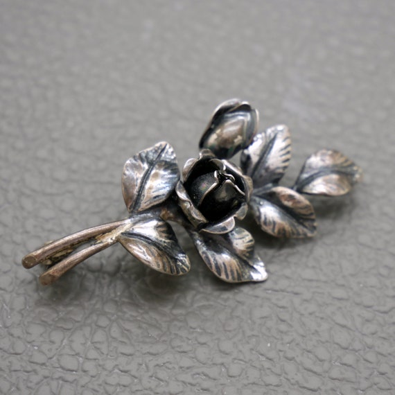 Silver rose brooch clearance