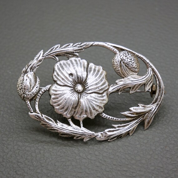 Broche ancienne, double clips en argent volutes serties de p - Lot 103