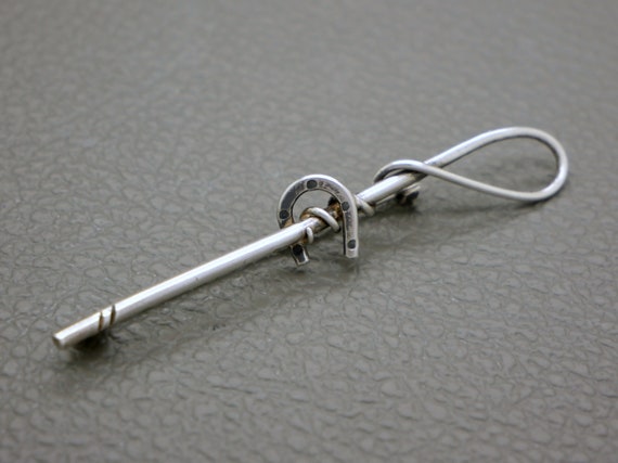 Broche cheval et poulain beau Sterling, signée, 3 g