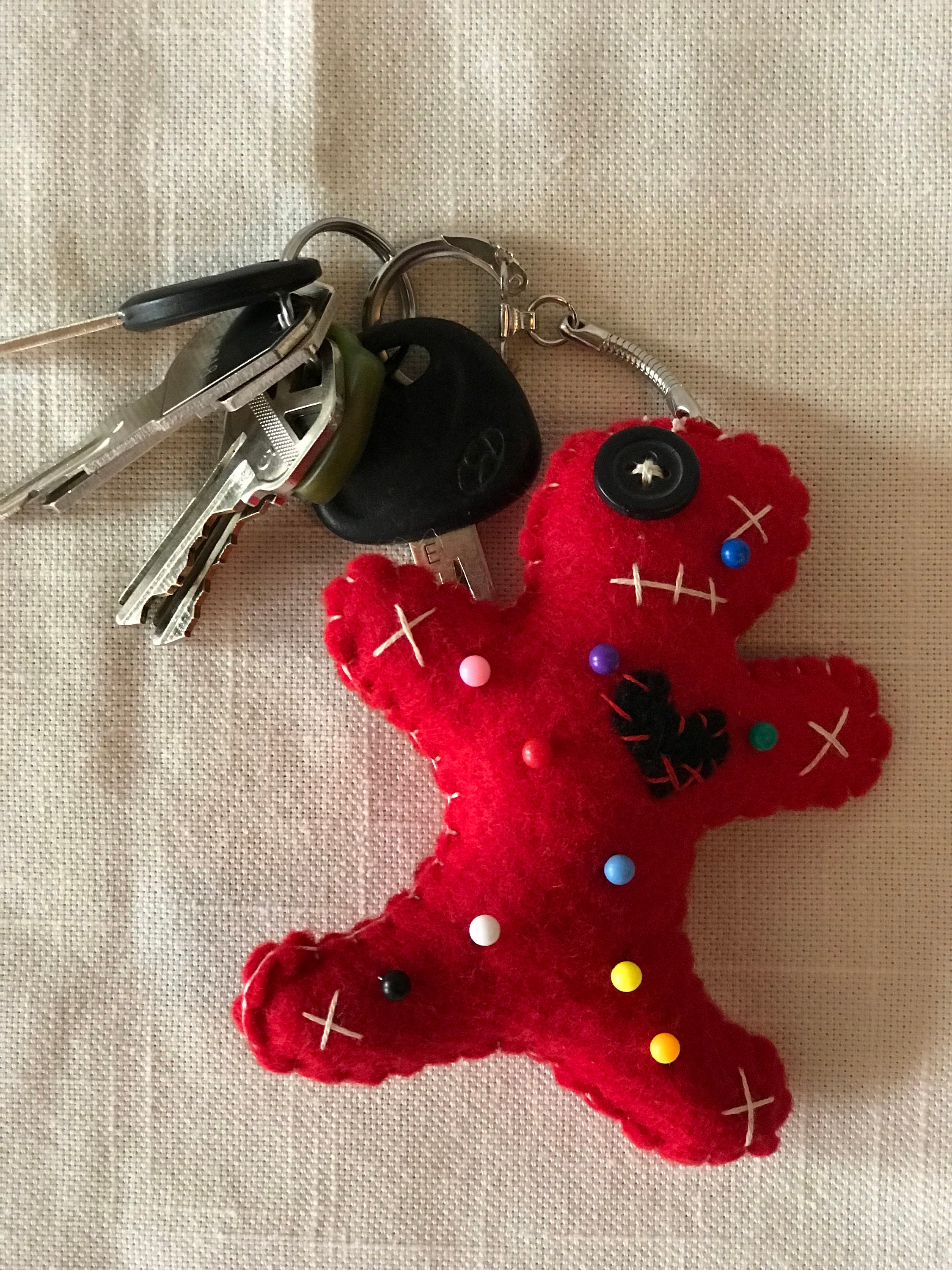 red voodoo doll