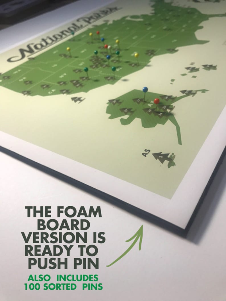 May include: A green map of the United States with push pins marking locations. The map is titled "National Parks" and includes the text "The foam board version is ready to push pin. Also includes 100 sorted pins."