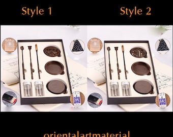 May include: Two sets of incense burning tools in wooden boxes. Each set includes a small wooden box with a lid, a small bag, two incense sticks, a small brush, two small glass jars, and three small wooden coasters. The boxes are labeled "Style 1" and "Style 2".