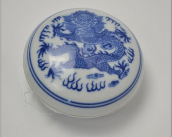 Red Cinnabar Ink Paste: Oriental Calligraphy Seal with Blue & White Porcelain Bowl