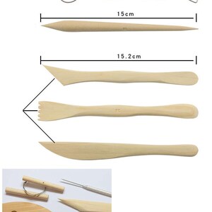 May include: Set of 7 wooden clay sculpting tools. The tools include a loop tool, a needle tool, a paddle tool, a rib tool, a scraper, a modelling tool, and a smoothing tool. The tools are all made of natural wood and are approximately 14-15 cm in length. The tools are displayed on a white background with the text "clay tools" and "orientalartmaterial" printed on the image.