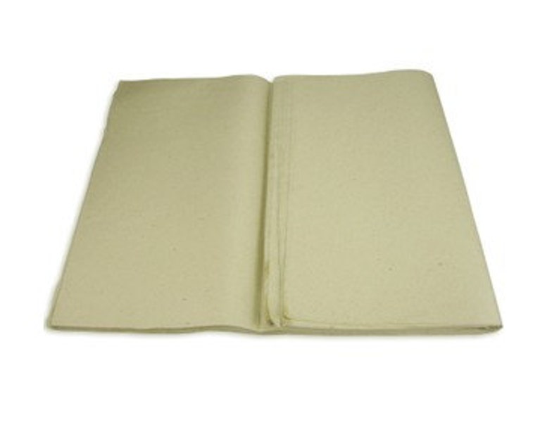 May include: A sheet of unbleached, off-white, natural paper. The paper is folded in half and has a slightly rough texture.