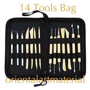 May include: A black zippered pouch containing 14 tools for sculpting clay. The tools are made of metal and wood and are arranged in rows in the pouch. The pouch has the text "14 Tools Bag" printed on the front and "orientalartmaterial" printed on the bottom.
