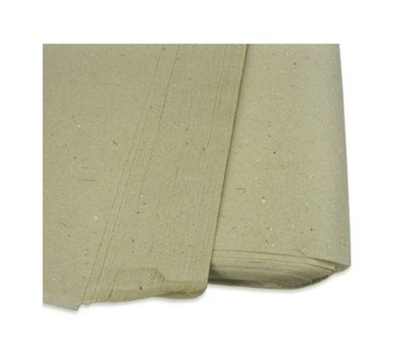 May include: A roll of beige craft paper with a speckled texture. The paper is rolled up and has a natural, rustic look.