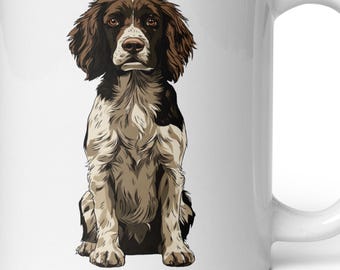 May include: White ceramic mug featuring a seated illustration of a Springer Spaniel dog. The dog has brown and white fur, with detailed facial features. The mug has a curved handle and a glossy finish, suitable for hot or cold beverages.