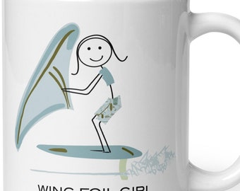 May include: White ceramic mug with a stick figure illustration of a person wing foiling. The text "WING FOIL GIRL" is printed on the mug.