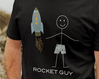 May include: Black t-shirt with a white stick figure holding a blue rocket with the text "ROCKET GUY" underneath.