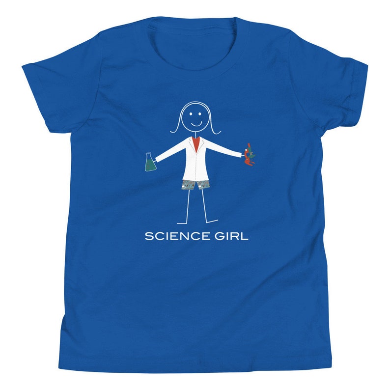 Puede incluir: Una camiseta azul real para j&oacute;venes con una ilustraci&oacute;n blanca de un personaje de palo que lleva una bata de laboratorio, sosteniendo un vaso de precipitados y un microscopio. El texto "SCIENCE GIRL" est&aacute; impreso debajo de la ilustraci&oacute;n.
