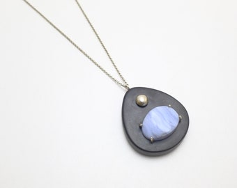 Ebony wood pendant wi Blue Lace Agate gemstone