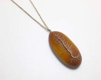 Wooden pendant with silver tree of life