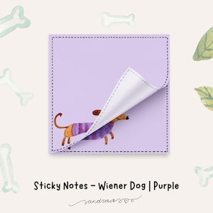 May include: A lilac sticky note featuring a watercolour illustration of a dachshund in a purple and white striped sweater. The note has a corner peeled back, revealing the dog. The image includes bone and leaf illustrations and the text "Sticky Notes - Wiener Dog | Purple".