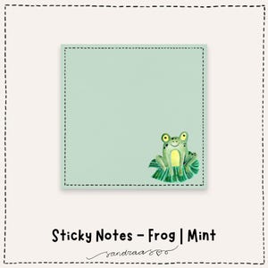 Op de afbeelding: Mintgroene plaknotitie met een aquarel illustratie van een lachende kikker op een waterlelie. De tekst "Sticky Notes - Frog | Mint" staat eronder, met de handtekening van de kunstenaar.