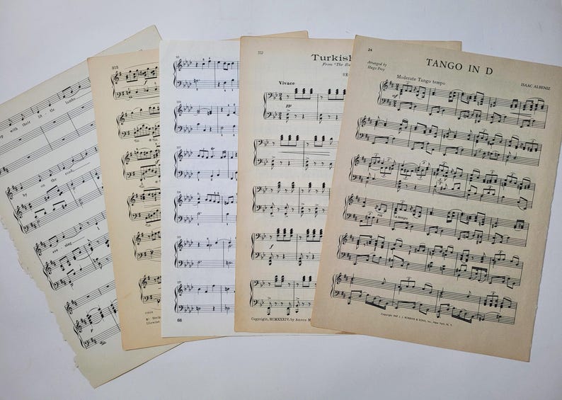 May include: Five sheets of vintage sheet music with musical notation. The titles are "Turkish March", "Tango in D", and "Wigan".