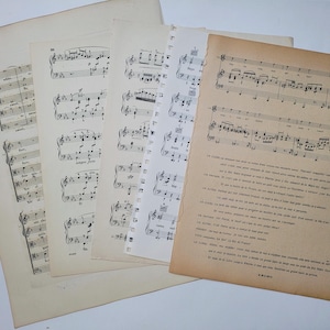 May include: A collection of vintage sheet music with musical notes and lyrics in black ink on white paper. The music is for a song called "Love is a Wonderful Thing".