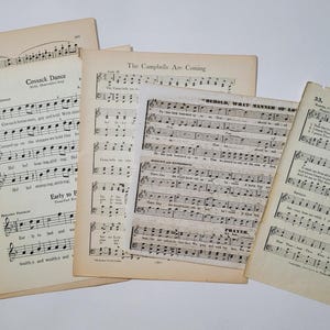 May include: Four pages of vintage sheet music with musical notation and lyrics. The titles include "Cossack Dance", "The Campbells Are Coming", "Behold What Manner of Love", and "Child's Prayer".
