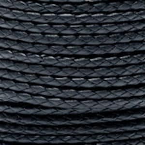 May include: Black braided leather cord, a close-up of the texture and weave of the cord.