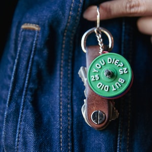 Weight keychain, a custom weightlifting keychain plates for coaches, powerlifters and athletes