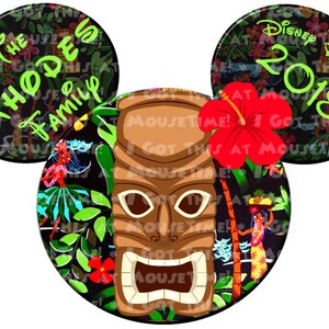 May include: A pair of Mickey Mouse ears with a tropical theme. The ears are black with green and red floral patterns. The center of the ears features a brown tiki mask with a green, red, and yellow floral pattern. The text "Disney Dream 2018" is on the right ear and "The Rhodes Family" is on the left ear.