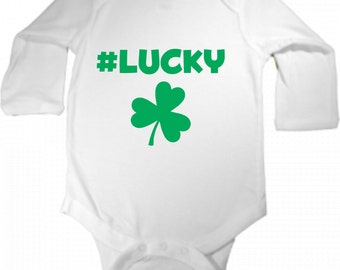 hash tag lucky - irish humor - baby bodysuit - long sleeved - boy or girl - - st patricks day or anyti white size 6/12 months last one