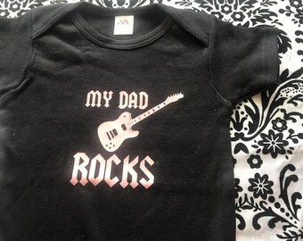 My dad rocks, baby bodysuit, cool dad, dad in a band, guitar, black with pink graphic girl size 12-18 months last one father's day