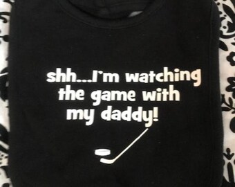 shhh, I'm watching the game with my daddy baby bib black hockey themed boy or girl gender neutral baby infant bib new last one