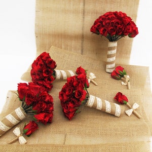 May include: Set of five red rose bouquets with burlap and lace wrapping. The bouquets are arranged on a burlap background.