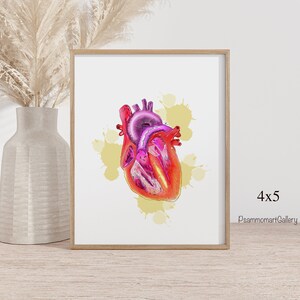 May include: A white ceramic mug with a black handle and the text "But First, Coffee" in a bold, black font. The mug is set against a blurred background, suggesting a cozy setting.